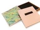 This special edition of J.K. Rowling’s Commencement address, with wooden case and hand-embossed Braille  (below), was crafted by Francie Randolph (left).