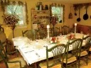 Meals are served at two communal tables in the restored barn.