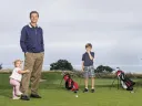 John West with his children—Georgia (20 months), Jack (8 years), and Danny (5 years)—at-hand audience members for, and friendly critics of, The Whistle 