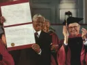 Photograph of Nelson Mandela receiving honorary degree and University Marshal Rick Hunt
