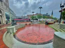 A red brick sunken pit in a plaza.