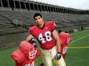 Defensive tackle Josue Ortiz with a blocking sled at Harvard Stadium