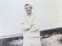 Henry Beston (in a Coast Guard uniform) on the Outer Beach, Cape Cod, in the early 1920s