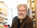 George Church&rsquo;s lab has reengineered the genetic code of the bacterium <i>Escherichia coli</i> to make it resistant to viral infection.