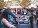 People perusing books outside at the Boston Book Festival 