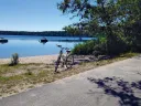Bike trail scene of Classic Cape Cod sand, water, and sky 
