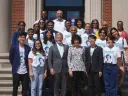 Photograph of the 2022 Frederick Douglass Fellows together with Nettie Washington Douglass and James Pellow.