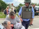 Newmark with an elderly Ukrainian woman