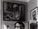 Davenport at home in 1975, with two of his own works behind him. An image of Ezra Pound by Richard Avedon partners Davenport’s portrait.
