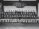 Happy campers: For their team photo, a day or two after The Game, the Crimson wore practice jerseys, giving them rather a raffish look.