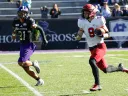 Harvard senior Cody Chrest runs with ball in hand