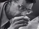 Photograph of E.O. Wilson observing ants