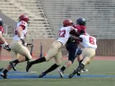 Linebacker Jacob Lindsey (51) trails the play as safety Reynaldo Kirton (22) and cornerback Brian Owusu (6) bring down Penn quarterback Billy Ragone. Ragone rushed for 95 yards and a touchdown, passing for two more Quaker scores in a 30-21 upset.