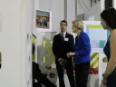 Sam Greenberg ’14 and Sarah Rosenkrantz ’14 walk Senator Elizabeth Warren through the soon-to-be-finished shelter.