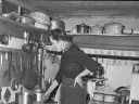 Child in her postwar Paris kitchen