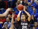 Corey Johnson ’19 (shown here against Kansas) sank six three-pointers in the BU game to lead the Crimson to a 75-69 victory. 