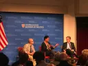 The three panelists on stage at the Kennedy School.