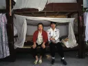 Factory girls in their dormitory, Guangdong Province